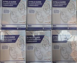 Image from above of several piles of the field guide